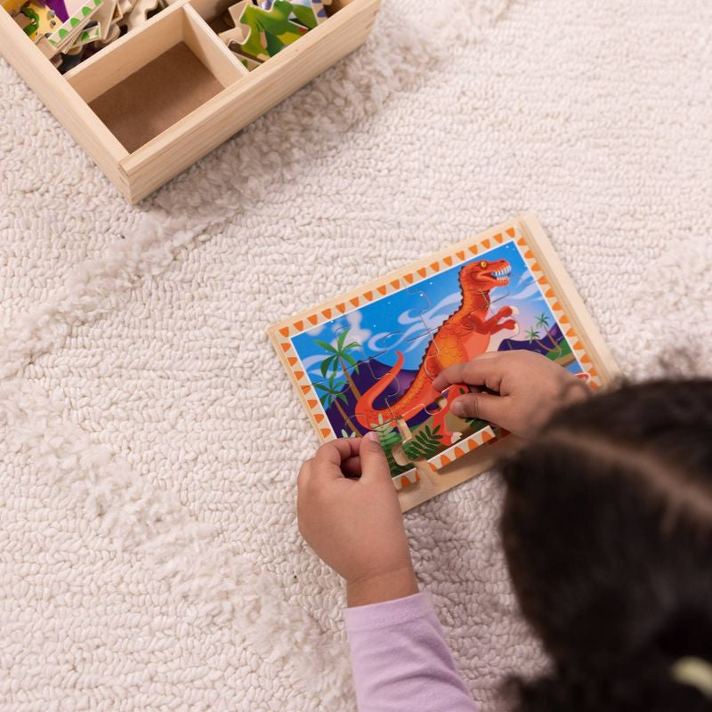 Juego de rompecabezas de madera para niños de Melissa & Doug Dinosaurs en una caja de almacenamiento - 4 piezas